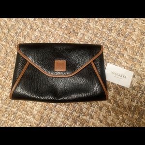 Nina Ricci large leather clutch